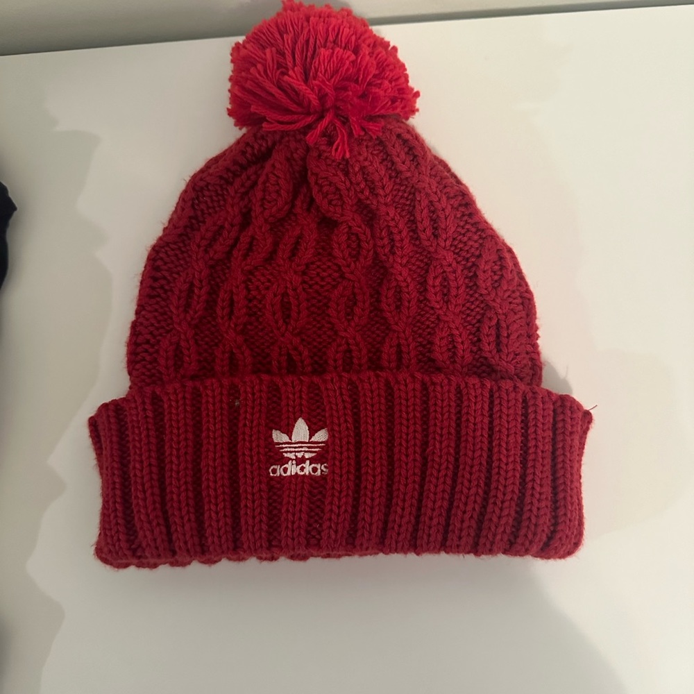 Adidas beanie. indiana logo on back. color is red